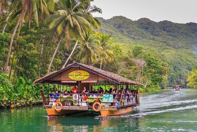 Bohol Countryside Day Tour From Cebu City | Lunch at Loboc River Cruise - Bilar Mahogany Forest: quick shade, interesting history