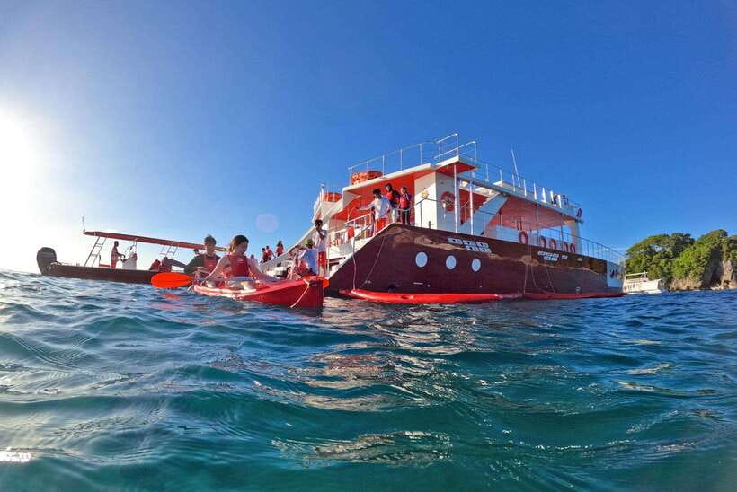 Boracay: Red Whale Party Cruise w/ Snacks & Water Activities - Boarding the Red Whale yacht from Balabag