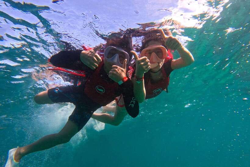 Boracay: Red Whale Party Cruise w/ Snacks & Water Activities - Paddleboarding, kayaking, and the waterslide water time