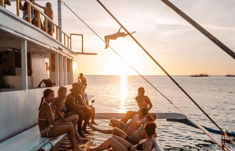 Boracay: Sunset Cruise Boat Party by Haqqy Life - DJ, games, and the first cruise leg