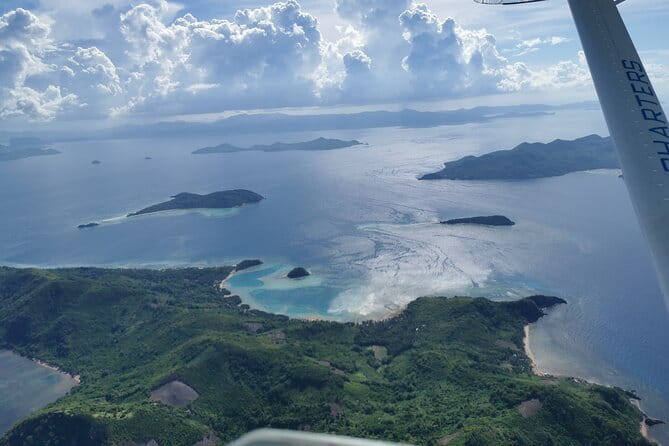 Busuanga Scenic Seaplane Flight 30 Minutes - Maricaban Bay: sheltered water, sandy shorelines, and a wreck site nearby