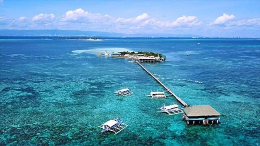Cebu: Mactan Island Hopping Boat Tour with Lunch - The boat ride rhythm: short cruises that keep the day moving