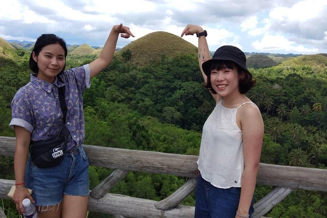 Chocolate hills tour with Tarsier & Loboc river Buffet Lunch (half-day tour) - Bohol highlights in one private half-day, from pickup to cruise