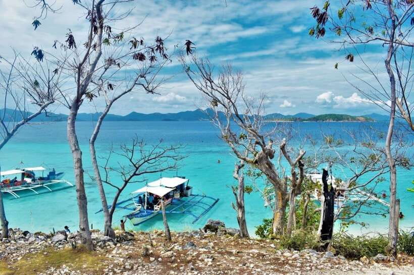 Coron: Coastal Cliffs, Beach & Malcapuya Island Hopping Tour - Food and drinks: local seafood BBQ plus snacks