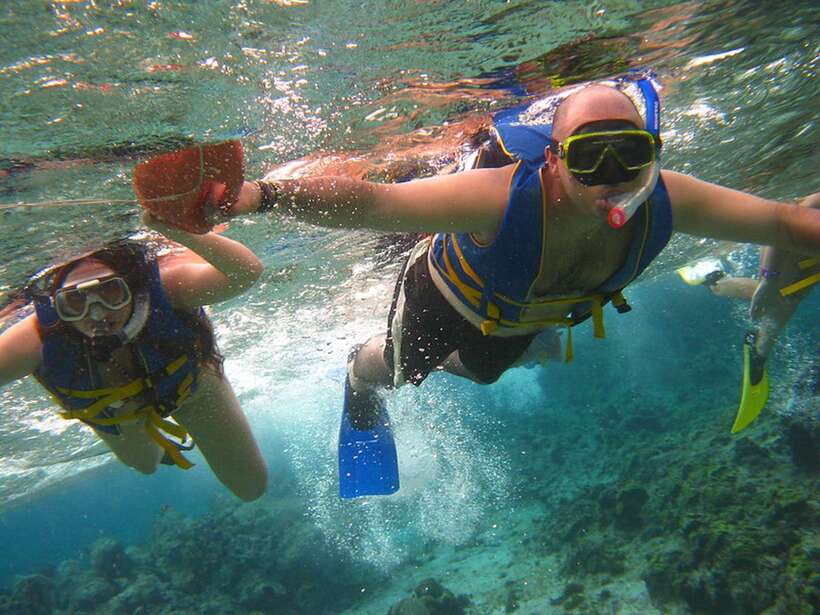 Coron: Coastal Cliffs, Beach & Malcapuya Island Hopping Tour - Boat comfort, timing, and how the day feels in real life