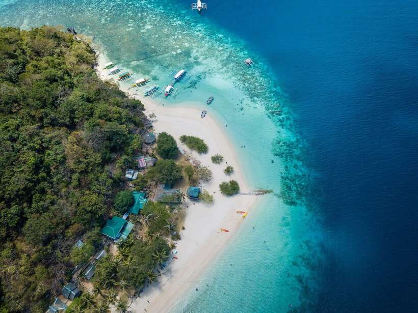 Coron: Coastal Cliffs, Beach & Malcapuya Island Hopping Tour - Banana Island: hammocks, soft sand, and a slower start