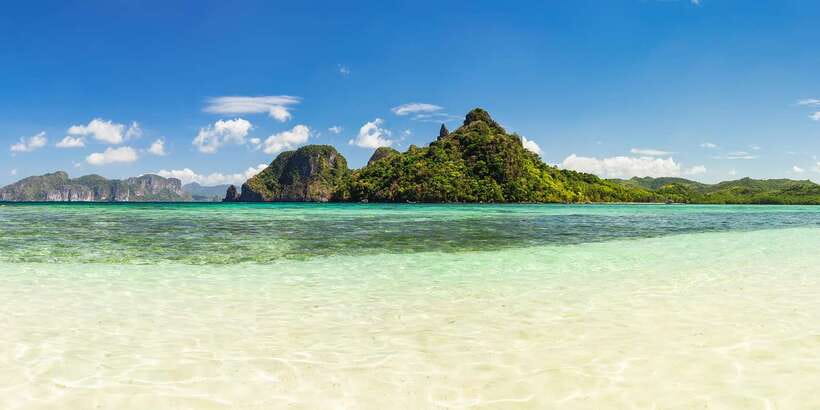 Coron Island Escapade: A Tropical Feast & Adventure - Malcapuya Island: Where the Swim Time Gets Real