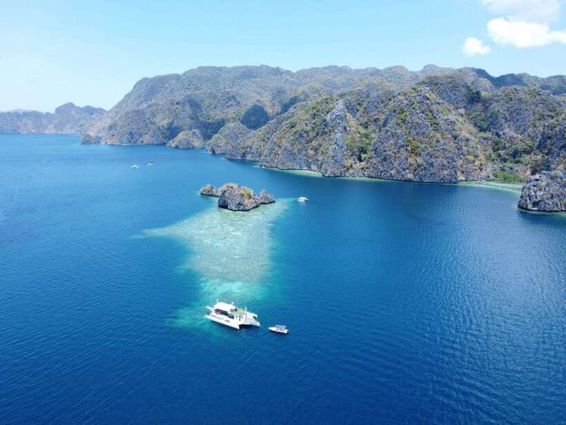 CORON:ISLAND TOUR A Lakes and Snorkeling with Corals - Kayangan Lake: Viewpoint First, Then the Clean-Water Swim