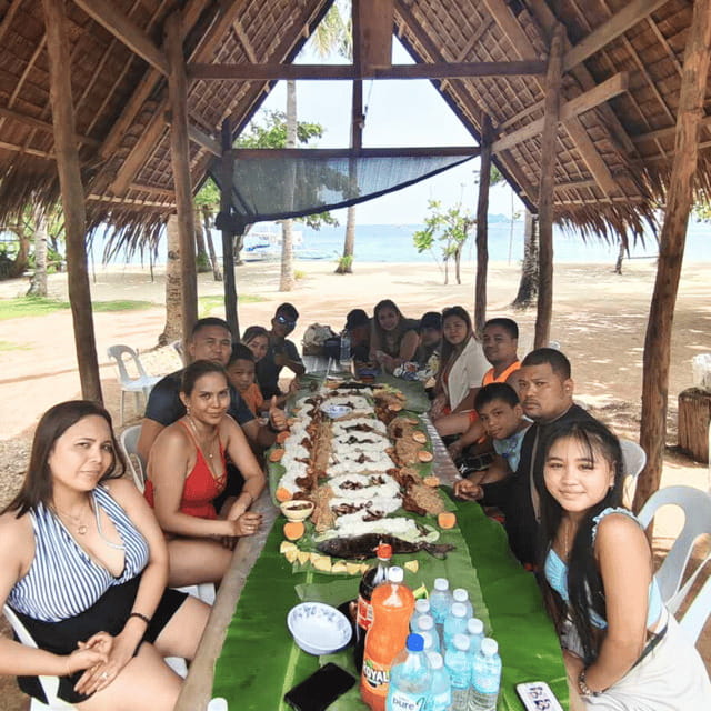 Coron Palawan - Island Escapade w/ Beachside Buffet Lunch - The guide and the included activities: snorkeling, fish feeding, and small helps