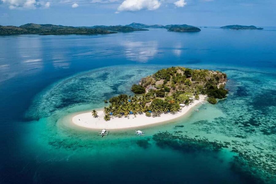 Coron: Reefs and Wrecks Tour with Snorkeling Equipment - Lusong Coral Garden: fish spotting and a photographer’s rhythm