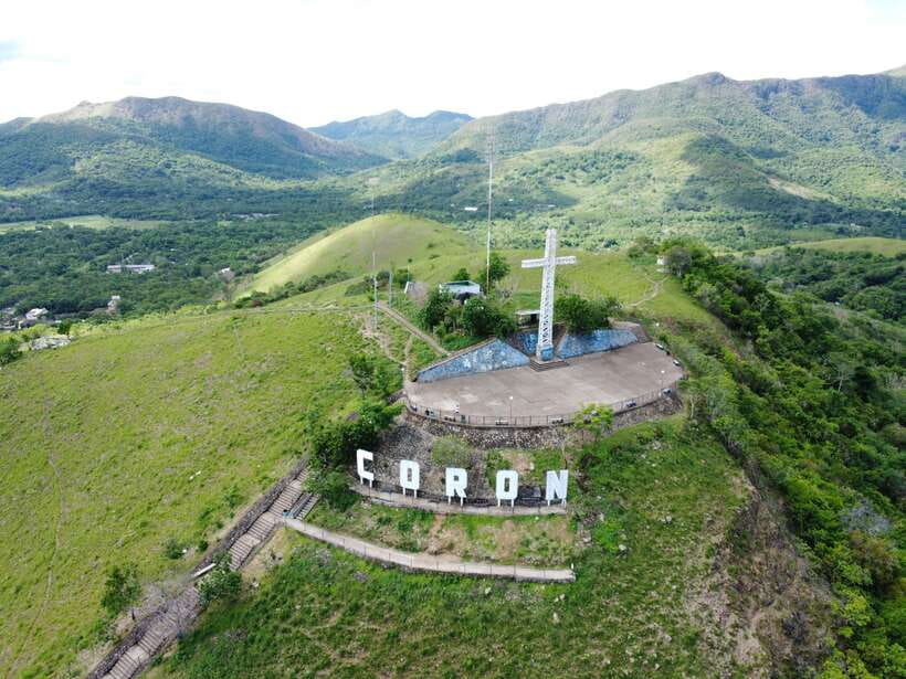 Coron Town Tour: Maquinit Hotspring & Mt. Tapyas Trekking - Coron Town tour flow: steps, church, parks, then hot spring calm