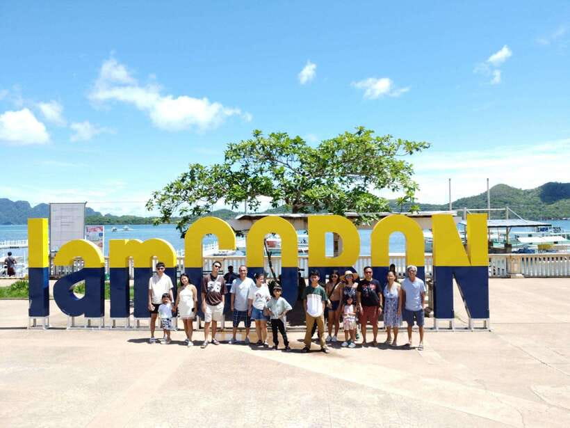 Coron Town Tour: Maquinit Hotspring & Mt. Tapyas Trekking - Lualhati Park and Coron Town Plaza: waterfront watching and easy people-life