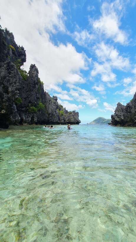 El Nido: Island Hopping and Snorkeling Private Boat Tour C - Hidden Beach: The Swim-in Secret You Have to Earn