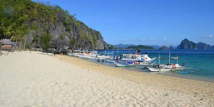 El Nido: Island Hopping Tour A Lagoons and Beaches - Snorkeling time in Bacuit Bay: fun, but plan for your feet