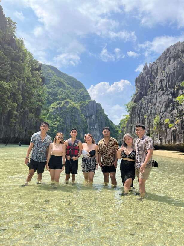 El Nido: Private/Exclusive Island Hopping Tour A BEST PRICE! - Payong-Payong Beach: Gentle Waves, Snorkeling Time, and Beach-Blanket Energy