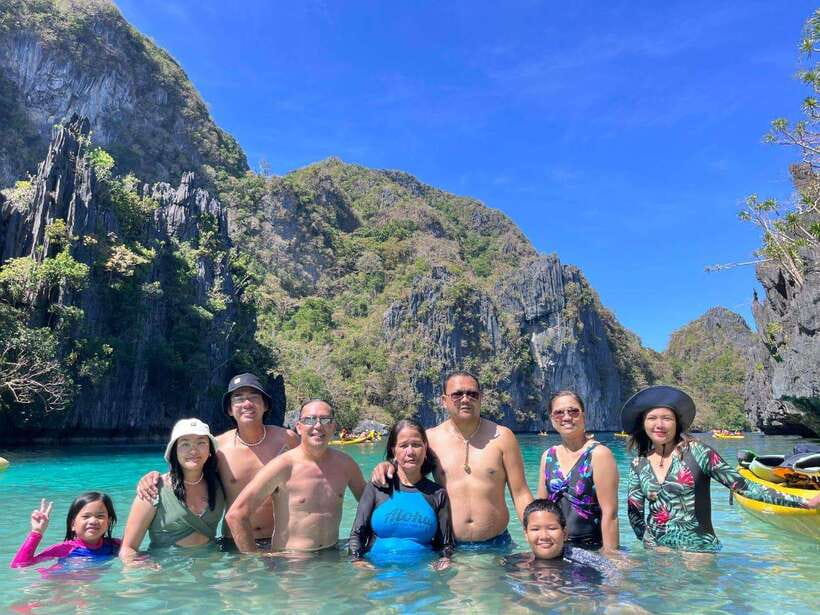 EL NIDO: Private Island Hopping Tour A with BUFFET LUNCH - Big Lagoon kayak time in a limestone amphitheater