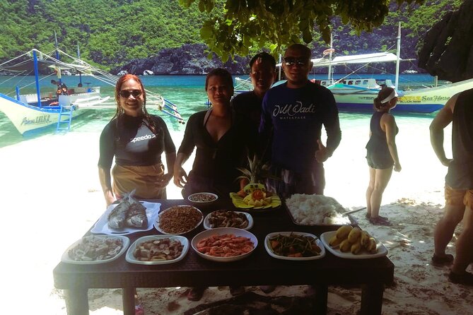 El Nido Tour A - Group w/ Buffet Lunch - Payong-Payong Beach: the classic sand and cliff scenery stop
