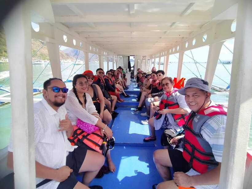 El Nido Tour C: Explore Hidden & Secret Beach Adventure - Secret Beach: cliff opening, enclosed lagoon feel