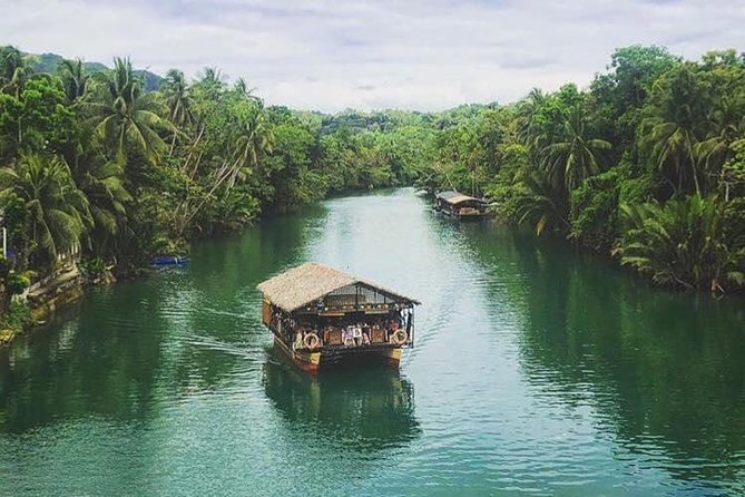 Famous Bohol Chocolate Hills Loboc River Cruise Tarsier Tour - Start in Tagbilaran with Sandugo history, then step into old stone
