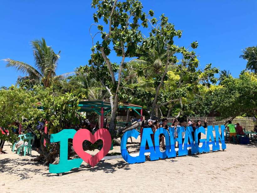 From Cebu: Island Hopping to 3 islands with BBQ lunch - Nalusuan Island White Sand Break: Pier Views and Easy Island Time
