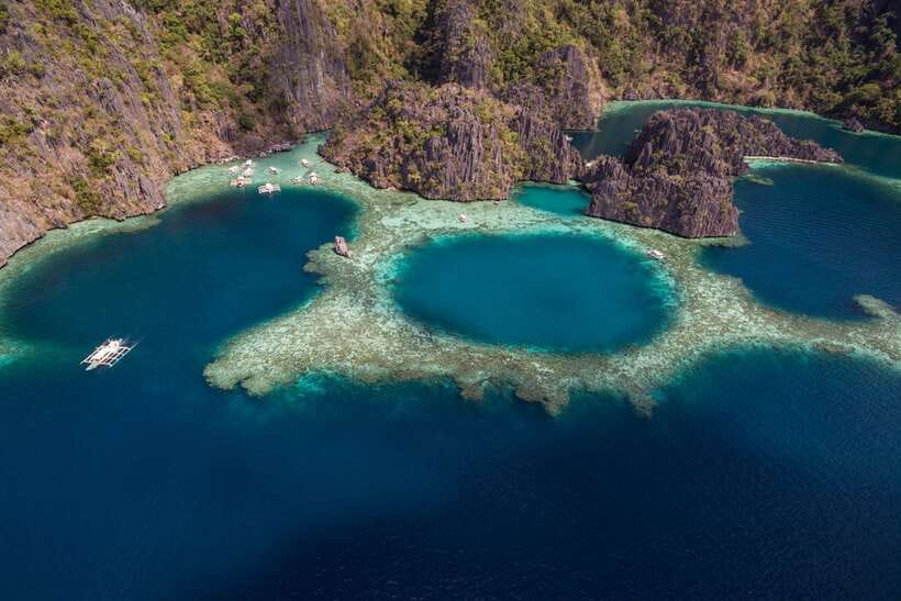 From Coron: Island Hopping Boat Day Trip with Buffet Lunch - Kayangan Lake Swim: The Freshwater-Style Highlight