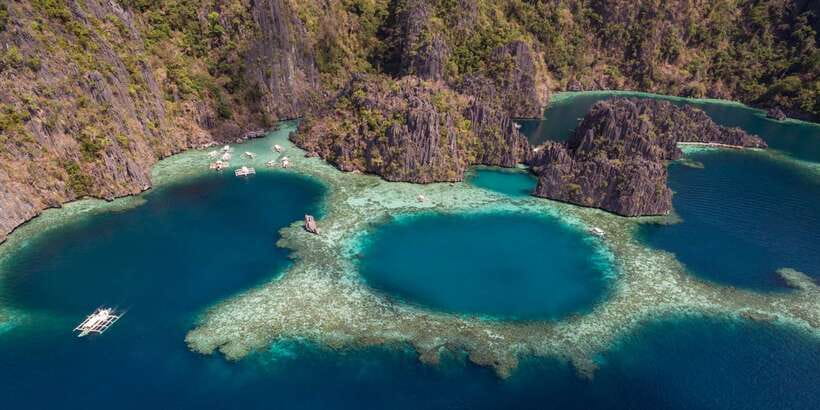 From Coron: Island Hopping Boat Day Trip with Buffet Lunch - Twin Lagoon: Another Time in the Water, Different Feel