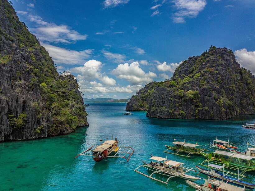 From Coron: Island Hopping Boat Day Trip with Buffet Lunch - Reef Garden and Coral Garden: Colorful Water Meets Good Snorkel Timing