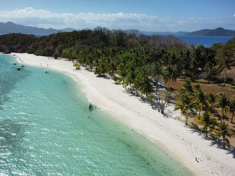 From Coron Town: Beaches and Islands Boat Tour with Lunch - Malcapuya Island: The White Sand Stretch and Why It Feels Like Boracay