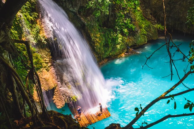 Full-Day Moalboal Islands and Kawasan Falls Small-Group Tour from Cebu - Kawasan Falls trek, swim, and the cool-water reality check