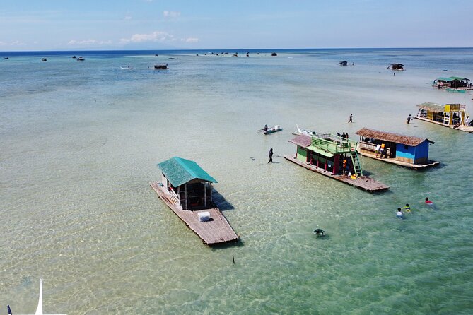 Island Hopping Experience: Snorkeling & Bamboo Cottages! - Getting there at 7:00 am, transfers, and the road you cannot skip
