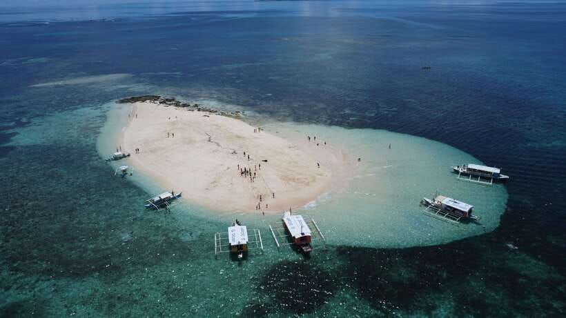 Luna: Siargao Tri-Island Tour with Drone, GoPro Shots, Lunch - Daku Island Lunch in a Reserved Cottage (Boodle Fight Style)
