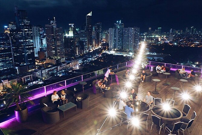 Makati: Music Clubs, Rooftops, and Go Go Bars Nightlife Tour - Where the night starts: Neon Nights Bar Club, P Burgos Street