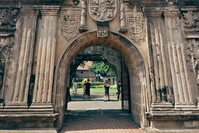 Manila Old & New City Walking Tour With A Guide - Roxas Boulevard and Rizal Park: views plus national identity