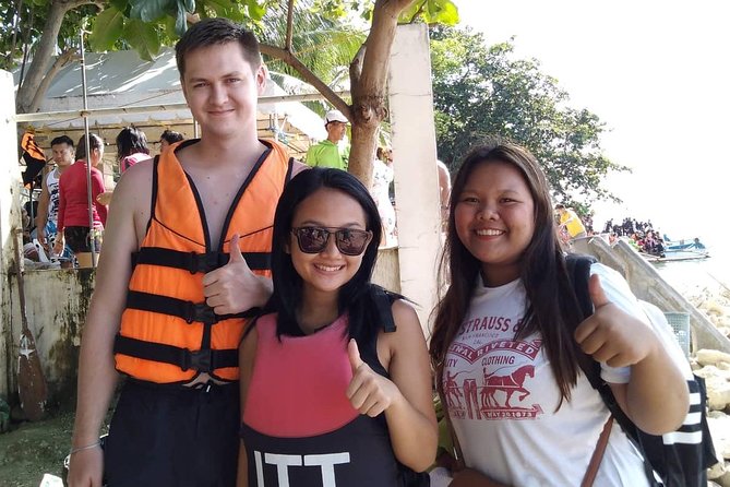 Oslob Whale Shark & Tumalog Falls & Kawasan Falls Canyoneering - Oslob whale shark watching: tickets, boat time, and swimming with a lifevest