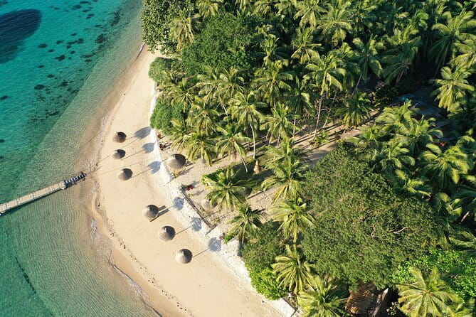 Port Barton Island Hopping - Seaplane Transfer FR Puerto Princesa - Bigaho Falls: the sandy boat stop and an easy walk to cool off