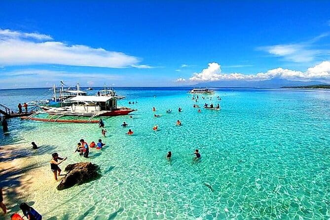 Private Island Hopping in Nasuluan, Hiltotongan and Caohngan - Pickup, pier, and the first boat transfer from Mactan